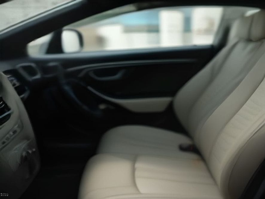 Interior detailing and dashboard cleaning at Zahrat Al Bustan Car Wash
